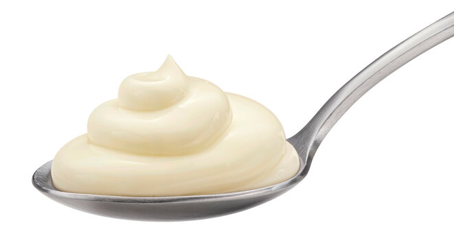 Spoon of mayonnaise isolated on white background, full depth of field