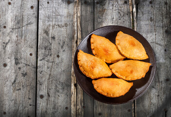 Argentinian empanadas stuffed with spicy meat - South American traditional food
