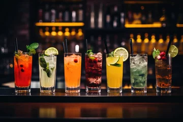 Fotobehang beautiful line of colorful alcoholic cocktails in a nightclub bar © InfiniteStudio
