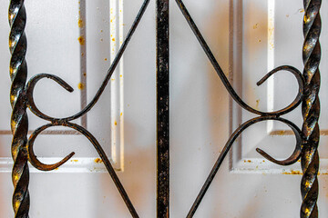 Artful old black metal railings doors gates and bars Mexico.