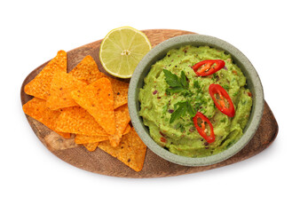Bowl of delicious guacamole, lime and nachos chips isolated on white, top view