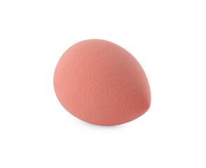 One coral makeup sponge isolated on white