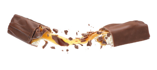 Broken chocolate bar with yummy caramel in air on white background