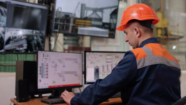 Engineer working, control room, Technician man. Engineer is busy in control room.