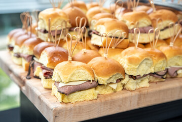 Roast beef mini sandwiches' platter at an event - obrazy, fototapety, plakaty