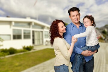Love concept, new home and happy young family