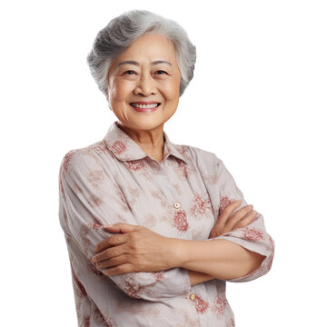Old beautiful asian woman happy face smiling with crossed arms looking at the camera isolated on white transparent background