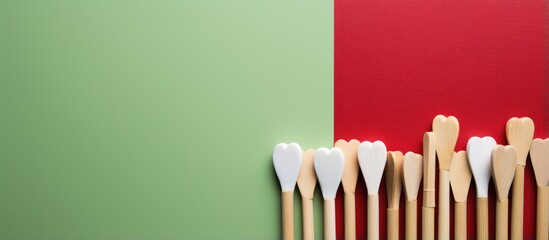 Valentines Day concept highlighting eco friendly alternatives bamboo toothbrushes toothpaste tablets red background representing creativity emphasizing plastic free and zero waste