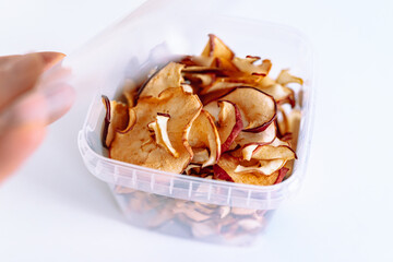 storing apple chips in an eco-plastic box