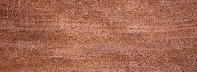 Closeup texture of wooden flooring made of Afromosia