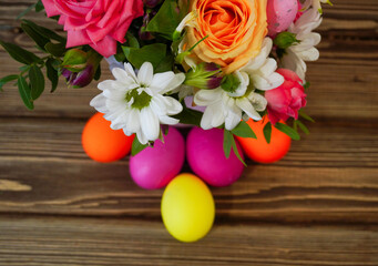 Happy easter! Flat Lay, Internet banner, postcard on Easter.  Bouquet of flowers and Easter eggs
