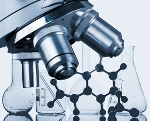 Laboratory research background of instrument and microscope with glassware