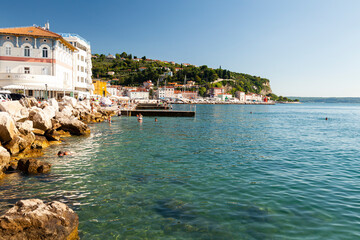 Bathers on the promenade, Piran, Adriatic coast, Istria, Slovenia, Europe