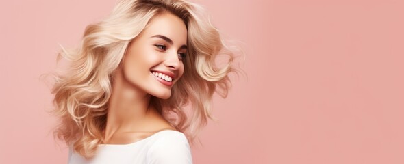 Smiling young woman with blonde long groomed hair isolated on pastel flat background with copy...