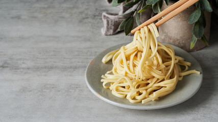 egg yellow noodle pasta on white table background. egg yellow noodle pasta table background. egg...