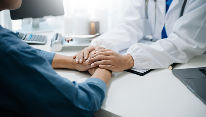 The doctor holds the patient’s. hand Healthcare and medical concept. In hospital.