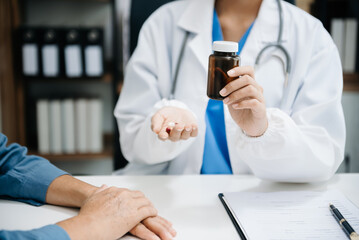 Doctors explain the use of medication to patients. healthcare and medical concept.