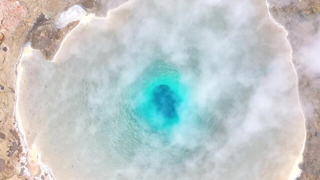 Aerial view of the blue boiling water of Great Geyser, geysir in the Golden Circle, Iceland