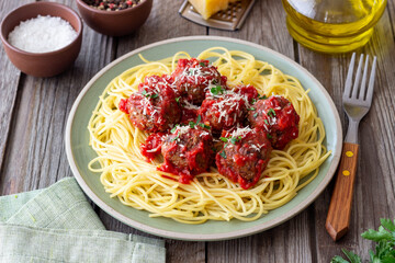 Pasta spaghetti with meatballs in tomato sauce. Italian food.