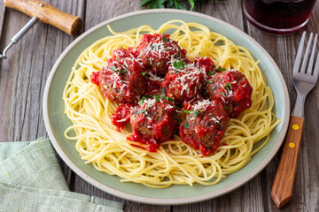 Pasta spaghetti with meatballs in tomato sauce. Italian food.