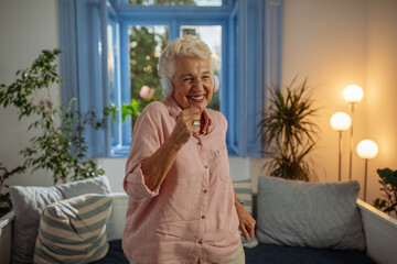 Grandma is enjoying her music at home