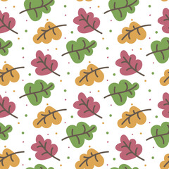 Pattern colorful cartoon autumn leaves falling on a white background. Autumn seamless texture for printing on textiles and paper. Children's ornament made of yellow, green, purple