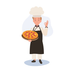 Young Chef Showing OK Sign. Happy Chef Doing OK Hand Sign and holding homemade pizza on tray in other hand