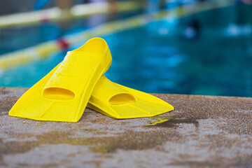 Children's swimming equipment at a swimming pool side