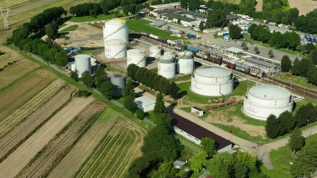 Fuel Transport by Rail - Engaging footage of trains transporting fuel, including gasoline, diesel, oil, and lubricants, ensuring a steady supply to a fuel dispensing facility.