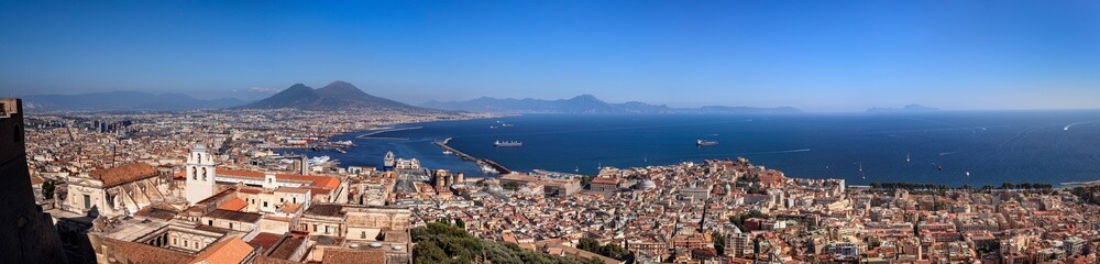View of the Gulf of Naples. Naples and the Mount Vesuvius with Capri in the distance from the Castel Sant'Elmo. - 656919481