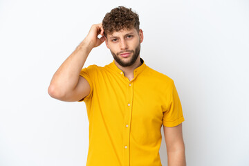 Fototapeta premium Young handsome caucasian man isolated on white background with an expression of frustration and not understanding