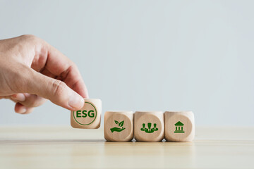 wooden cubes with icon ESG and finance for ESG environment social governance investment business concept and sustainable organizational development for society, and corporate governance - obrazy, fototapety, plakaty