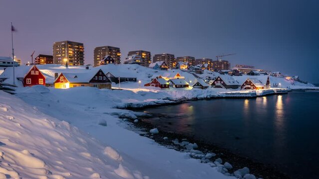 Sunrise of the skyline in Nuuk, the capital of Greenland at wintertime. A time lapse clip.