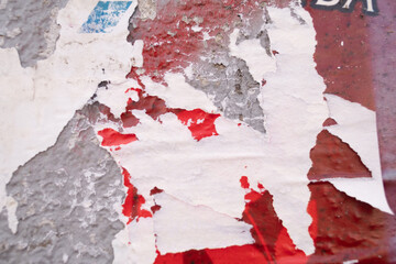Ripped street poster background. Torn abstract and grungy paper backdrop.
