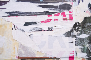 Fototapeta premium Ripped street poster background. Torn abstract and grungy paper backdrop.
