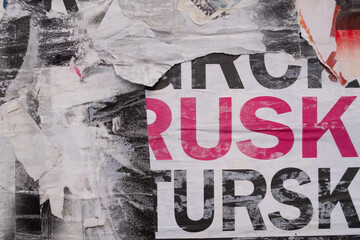 Ripped street poster background. Torn abstract and grungy paper backdrop.