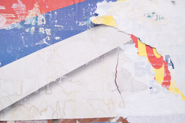 Ripped street poster background. Torn abstract and grungy paper backdrop.