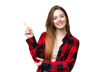 Young pretty woman over isolated chroma key background happy and pointing up