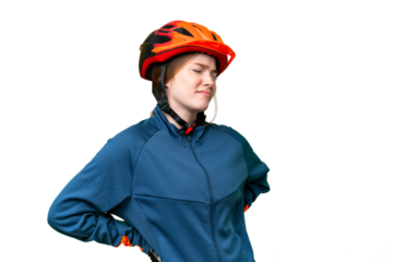 Young cyclist woman over isolated chroma key background suffering from backache for having made an effort