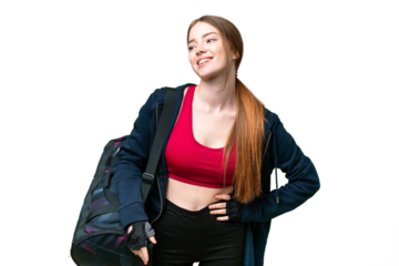 Young sport woman with sport bag over isolated chroma key background posing with arms at hip and smiling
