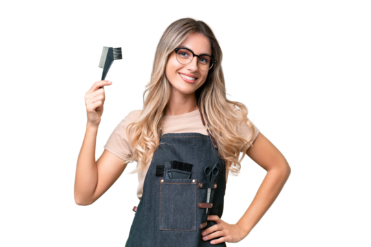 Young Uruguayan hairdresser woman over isolated background posing with arms at hip and smiling