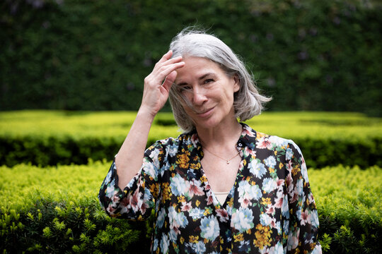 Senior woman spending leisure time in park