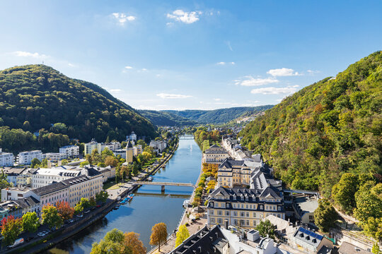 Germany, Rhineland-Palatinate, Bad Ems, View of spa town on Lahn river and surrounding hills in summer