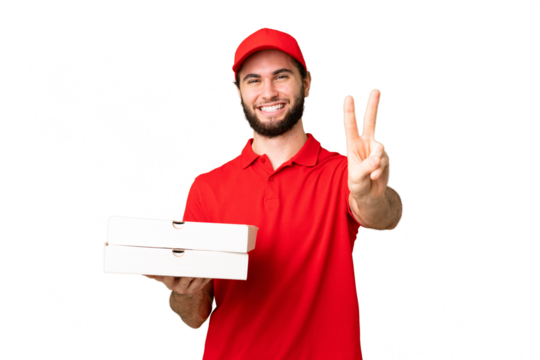 pizza delivery man with work uniform picking up pizza boxes over isolated chroma key background smiling and showing victory sign