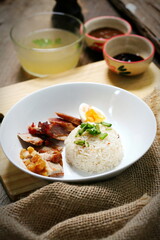 Rice with red roast pork topped with sweet sauce. Asian food fusion style