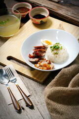 Rice with red roast pork topped with sweet sauce. Asian food fusion style