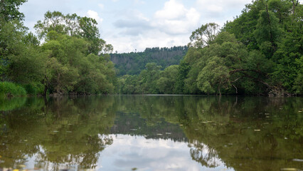 Fototapeta na wymiar A River landscape - The river Eder in a green landscape