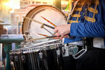 A brass band plays in a city park.