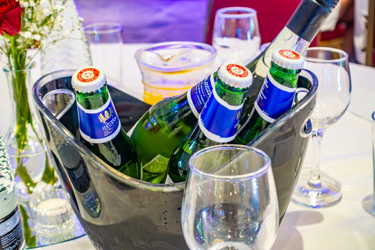 Bottles of Peroni beer served on a table at a party