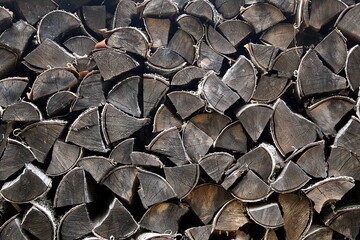 Abstract texture from stacked wooden logs.
